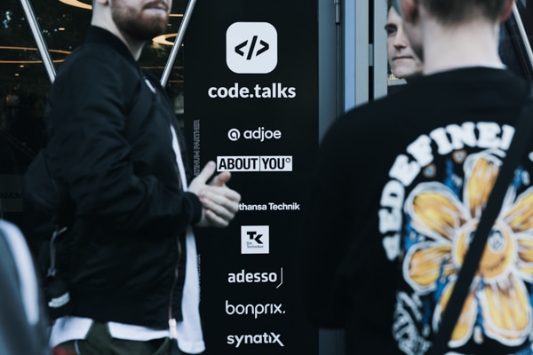 Collage image showing people at a previous code.talks event